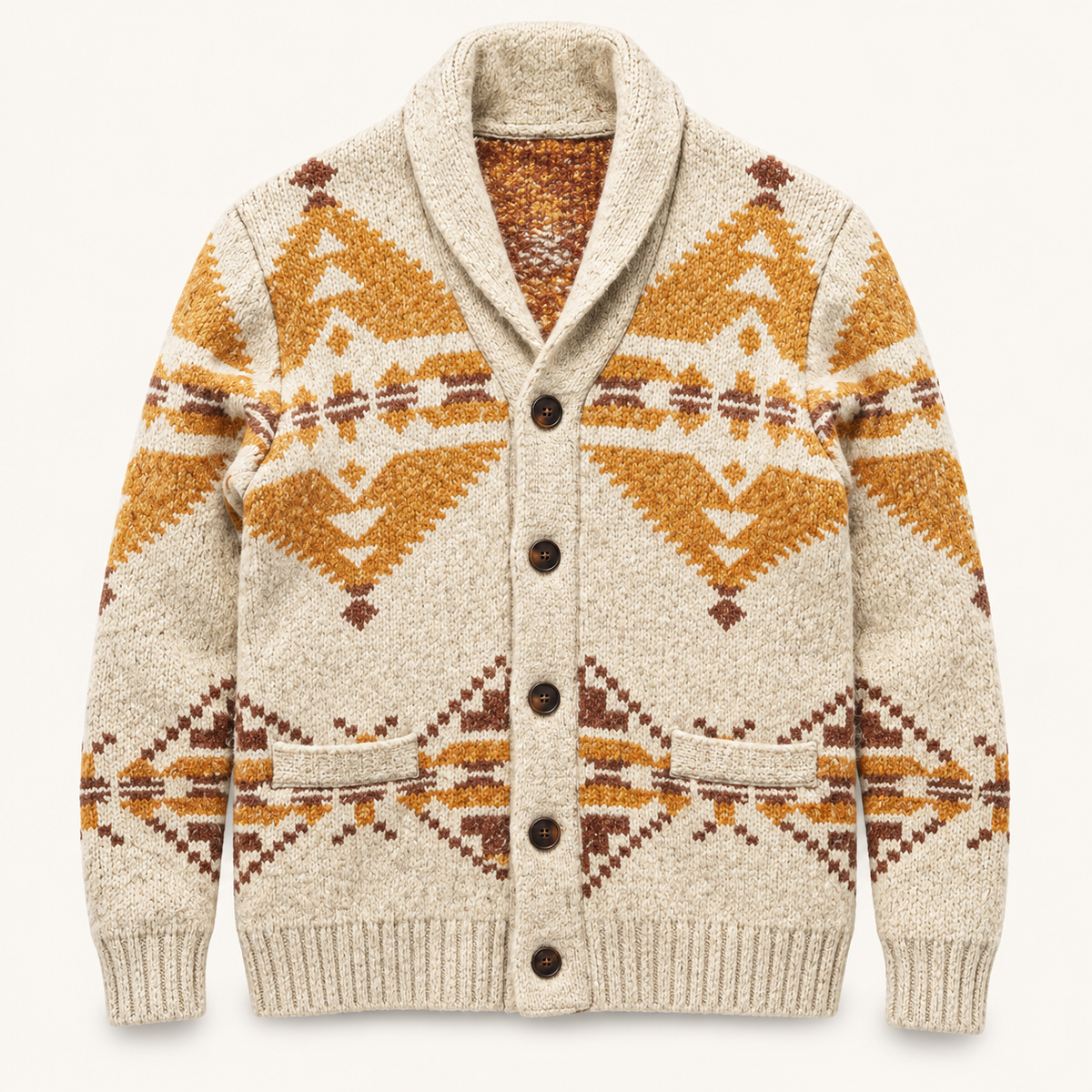 A cream-colored knit cardigan sweater with a brown and ochre orange geometric pattern, featuring a shawl collar, dark brown buttons, and a ribbed hem and cuffs, shown flat on a light off-white background.